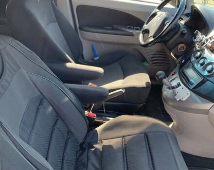 Черный Мицубиси Грандис, объемом двигателя 2.38 л и пробегом 180 тыс. км за 6800 $, фото 5 на Automoto.ua