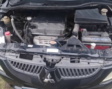 Черный Мицубиси Грандис, объемом двигателя 2.4 л и пробегом 340 тыс. км за 55000 $, фото 7 на Automoto.ua