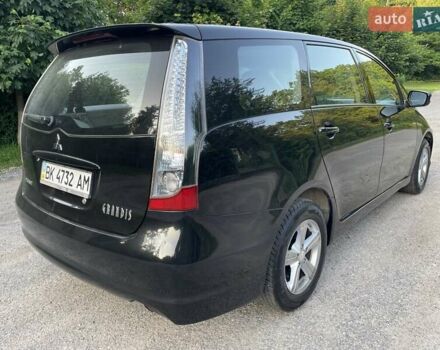 Черный Мицубиси Грандис, объемом двигателя 2.4 л и пробегом 49 тыс. км за 9250 $, фото 59 на Automoto.ua