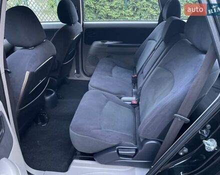 Черный Мицубиси Грандис, объемом двигателя 2.4 л и пробегом 49 тыс. км за 9250 $, фото 191 на Automoto.ua