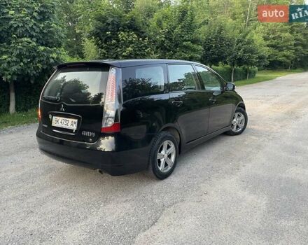 Черный Мицубиси Грандис, объемом двигателя 2.4 л и пробегом 49 тыс. км за 9250 $, фото 120 на Automoto.ua