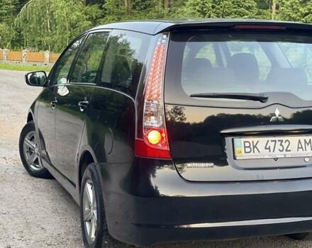 Черный Мицубиси Грандис, объемом двигателя 2.4 л и пробегом 49 тыс. км за 9250 $, фото 113 на Automoto.ua