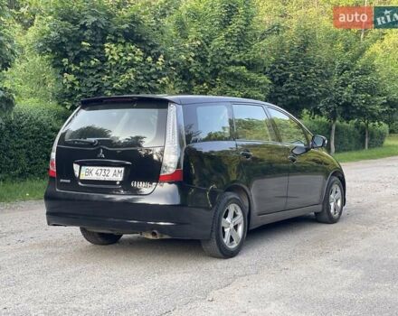 Черный Мицубиси Грандис, объемом двигателя 2.4 л и пробегом 49 тыс. км за 9250 $, фото 14 на Automoto.ua