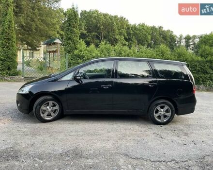 Черный Мицубиси Грандис, объемом двигателя 2.4 л и пробегом 49 тыс. км за 9250 $, фото 117 на Automoto.ua
