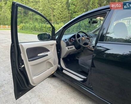 Черный Мицубиси Грандис, объемом двигателя 2.4 л и пробегом 49 тыс. км за 9250 $, фото 151 на Automoto.ua