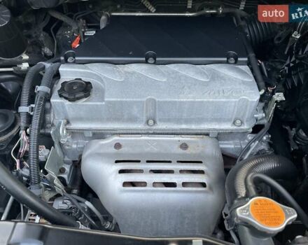 Черный Мицубиси Грандис, объемом двигателя 2.4 л и пробегом 49 тыс. км за 9250 $, фото 124 на Automoto.ua