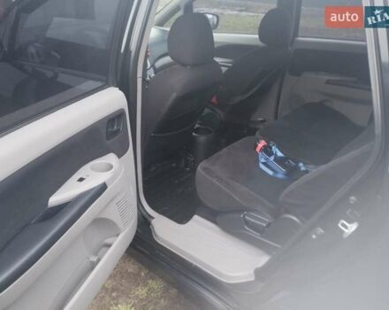 Черный Мицубиси Грандис, объемом двигателя 2.4 л и пробегом 340 тыс. км за 5500 $, фото 7 на Automoto.ua