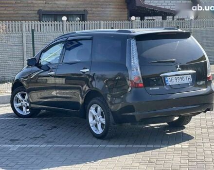 Черный Мицубиси Грандис, объемом двигателя 2.4 л и пробегом 137 тыс. км за 10700 $, фото 5 на Automoto.ua