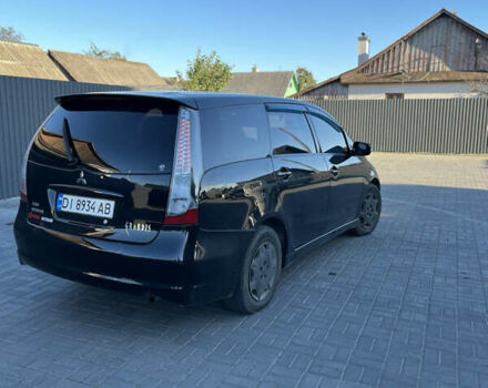 Черный Мицубиси Грандис, объемом двигателя 2.4 л и пробегом 290 тыс. км за 4600 $, фото 3 на Automoto.ua