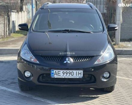 Черный Мицубиси Грандис, объемом двигателя 2.4 л и пробегом 137 тыс. км за 10700 $, фото 1 на Automoto.ua