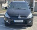 Черный Мицубиси Грандис, объемом двигателя 2.4 л и пробегом 137 тыс. км за 10700 $, фото 1 на Automoto.ua
