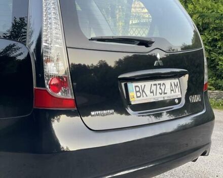 Черный Мицубиси Грандис, объемом двигателя 2.4 л и пробегом 49 тыс. км за 9250 $, фото 55 на Automoto.ua
