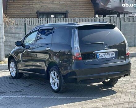 Черный Мицубиси Грандис, объемом двигателя 2.4 л и пробегом 137 тыс. км за 10700 $, фото 9 на Automoto.ua
