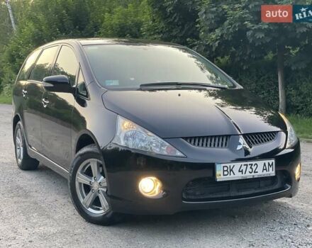 Черный Мицубиси Грандис, объемом двигателя 2.4 л и пробегом 49 тыс. км за 9250 $, фото 109 на Automoto.ua