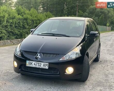 Черный Мицубиси Грандис, объемом двигателя 2.4 л и пробегом 49 тыс. км за 9250 $, фото 111 на Automoto.ua
