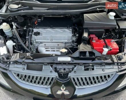 Черный Мицубиси Грандис, объемом двигателя 2.4 л и пробегом 49 тыс. км за 9250 $, фото 123 на Automoto.ua