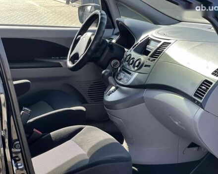 Черный Мицубиси Грандис, объемом двигателя 2.4 л и пробегом 137 тыс. км за 10700 $, фото 14 на Automoto.ua