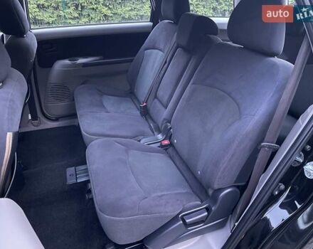 Черный Мицубиси Грандис, объемом двигателя 2.4 л и пробегом 49 тыс. км за 9250 $, фото 192 на Automoto.ua