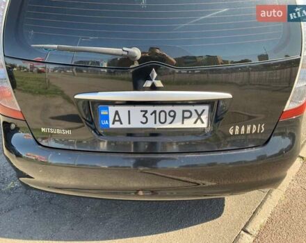 Черный Мицубиси Грандис, объемом двигателя 2.38 л и пробегом 180 тыс. км за 6800 $, фото 13 на Automoto.ua