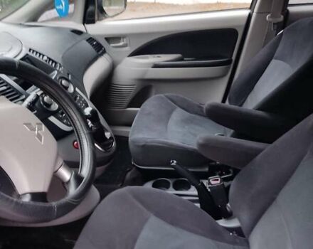 Чорний Міцубісі Грандіс, об'ємом двигуна 2.4 л та пробігом 235 тис. км за 5999 $, фото 26 на Automoto.ua