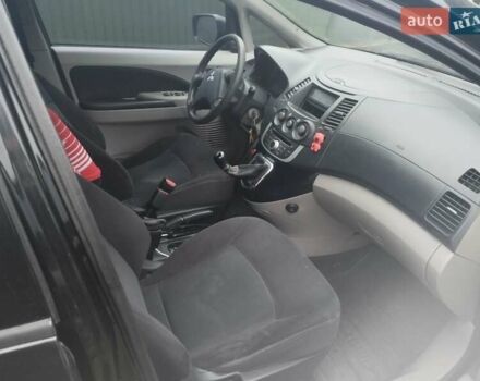 Черный Мицубиси Грандис, объемом двигателя 2.4 л и пробегом 340 тыс. км за 5500 $, фото 5 на Automoto.ua