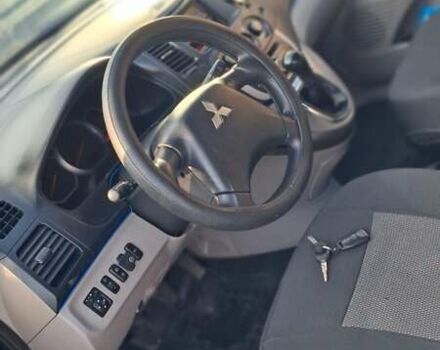 Чорний Міцубісі Грандіс, об'ємом двигуна 2.38 л та пробігом 254 тис. км за 6400 $, фото 11 на Automoto.ua