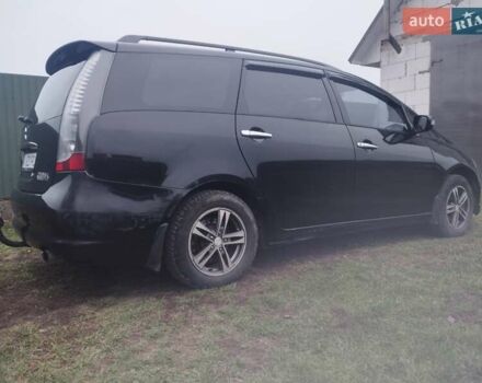 Черный Мицубиси Грандис, объемом двигателя 2.4 л и пробегом 340 тыс. км за 5500 $, фото 3 на Automoto.ua