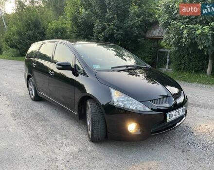 Черный Мицубиси Грандис, объемом двигателя 2.4 л и пробегом 49 тыс. км за 9250 $, фото 116 на Automoto.ua