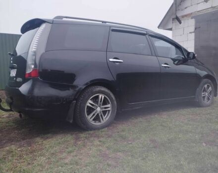 Черный Мицубиси Грандис, объемом двигателя 2.4 л и пробегом 340 тыс. км за 55000 $, фото 2 на Automoto.ua