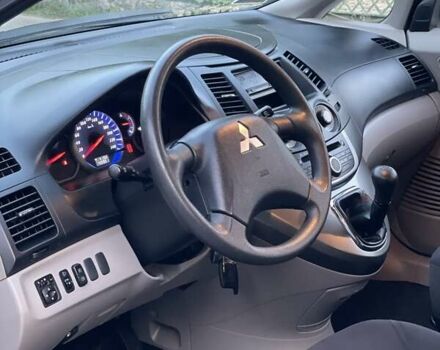 Черный Мицубиси Грандис, объемом двигателя 2.4 л и пробегом 49 тыс. км за 9250 $, фото 162 на Automoto.ua