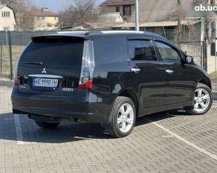 Черный Мицубиси Грандис, объемом двигателя 2.4 л и пробегом 137 тыс. км за 10700 $, фото 3 на Automoto.ua