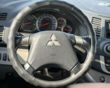 Черный Мицубиси Грандис, объемом двигателя 2.4 л и пробегом 137 тыс. км за 10700 $, фото 12 на Automoto.ua