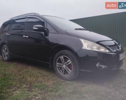 Черный Мицубиси Грандис, объемом двигателя 2.4 л и пробегом 340 тыс. км за 5500 $, фото 1 на Automoto.ua
