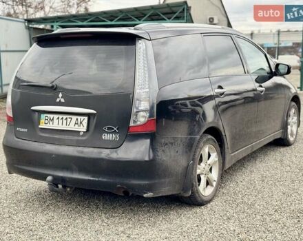 Черный Мицубиси Грандис, объемом двигателя 2.4 л и пробегом 185 тыс. км за 5899 $, фото 10 на Automoto.ua