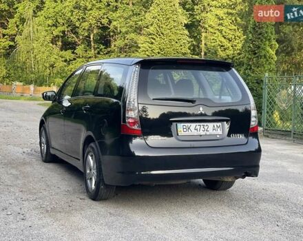 Черный Мицубиси Грандис, объемом двигателя 2.4 л и пробегом 49 тыс. км за 9250 $, фото 13 на Automoto.ua