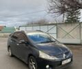 Черный Мицубиси Грандис, объемом двигателя 2.4 л и пробегом 430 тыс. км за 4000 $, фото 1 на Automoto.ua