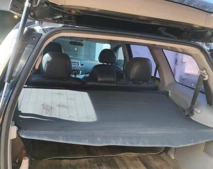 Черный Мицубиси Грандис, объемом двигателя 2.38 л и пробегом 248 тыс. км за 7200 $, фото 1 на Automoto.ua