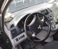 Черный Мицубиси Грандис, объемом двигателя 2.38 л и пробегом 253 тыс. км за 8700 $, фото 2 на Automoto.ua