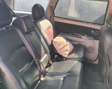 Черный Мицубиси Грандис, объемом двигателя 2.38 л и пробегом 248 тыс. км за 7200 $, фото 3 на Automoto.ua