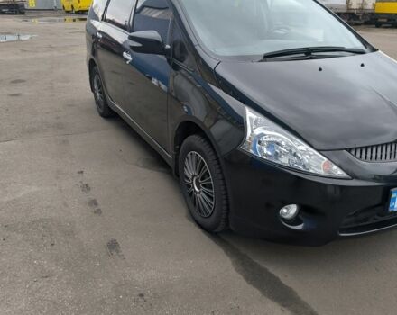 Черный Мицубиси Грандис, объемом двигателя 2.4 л и пробегом 62 тыс. км за 8500 $, фото 1 на Automoto.ua