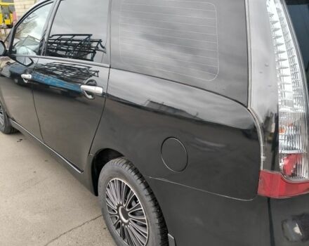 Черный Мицубиси Грандис, объемом двигателя 2.4 л и пробегом 62 тыс. км за 8500 $, фото 3 на Automoto.ua