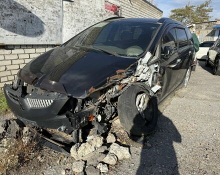 Черный Мицубиси Грандис, объемом двигателя 2.4 л и пробегом 220 тыс. км за 3200 $, фото 2 на Automoto.ua