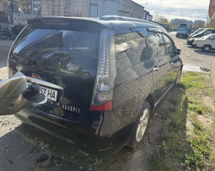 Черный Мицубиси Грандис, объемом двигателя 2.4 л и пробегом 220 тыс. км за 3200 $, фото 1 на Automoto.ua