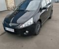 Черный Мицубиси Грандис, объемом двигателя 2.4 л и пробегом 62 тыс. км за 8500 $, фото 1 на Automoto.ua