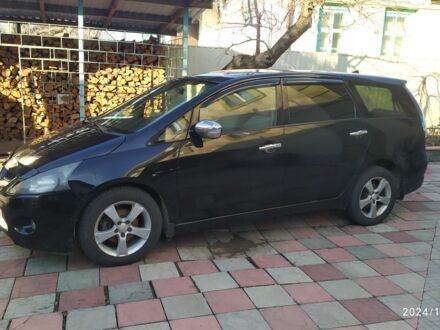 Чорний Міцубісі Грандіс, об'ємом двигуна 2.4 л та пробігом 282 тис. км за 4700 $, фото 1 на Automoto.ua
