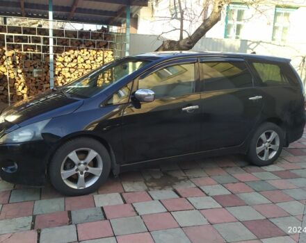 Чорний Міцубісі Грандіс, об'ємом двигуна 2.4 л та пробігом 282 тис. км за 4700 $, фото 1 на Automoto.ua