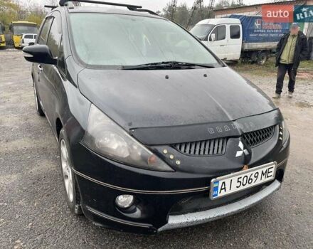 Черный Мицубиси Грандис, объемом двигателя 2.4 л и пробегом 311 тыс. км за 5350 $, фото 1 на Automoto.ua