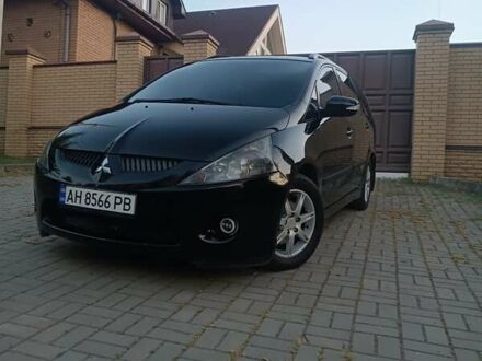 Черный Мицубиси Грандис, объемом двигателя 2.4 л и пробегом 270 тыс. км за 6200 $, фото 1 на Automoto.ua