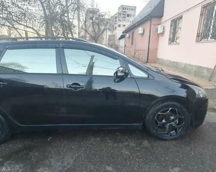 Черный Мицубиси Грандис, объемом двигателя 2.38 л и пробегом 295 тыс. км за 5399 $, фото 1 на Automoto.ua