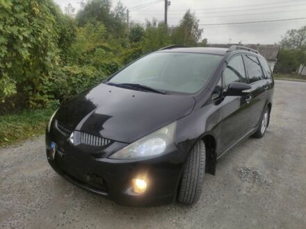 Черный Мицубиси Грандис, объемом двигателя 2 л и пробегом 309 тыс. км за 5850 $, фото 1 на Automoto.ua